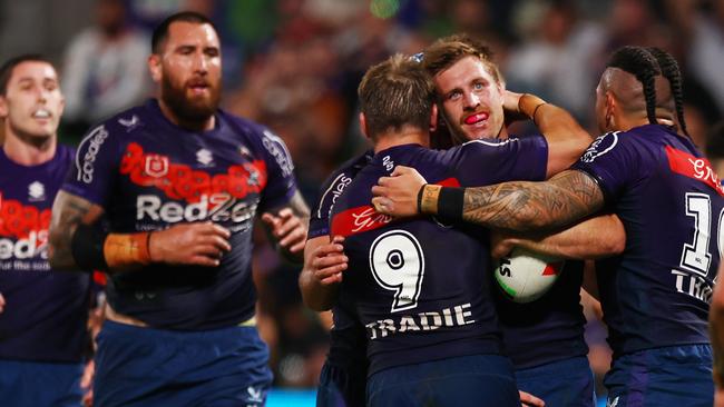 MELBOURNE, AUSTRALIA - APRIL 25: Cameron Munster of the Storm celebrates scoring a try during the round eight NRL match between Melbourne Storm and New Zealand Warriors at AAMI Park on April 25, 2023 in Melbourne, Australia. (Photo by Graham Denholm/Getty Images)