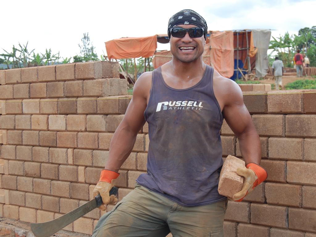 Penrith great Joe Galuvao working at the Hope Rwanda Village in Kigali, Rawanda.