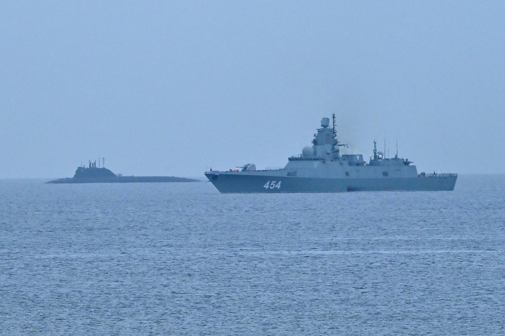 The Russian nuclear-powered submarine Kazan and the frigate Admiral Gorshkov, part of the Russian naval detachment visiting Cuba, arrive at Havana's harbor on June 12, 2024