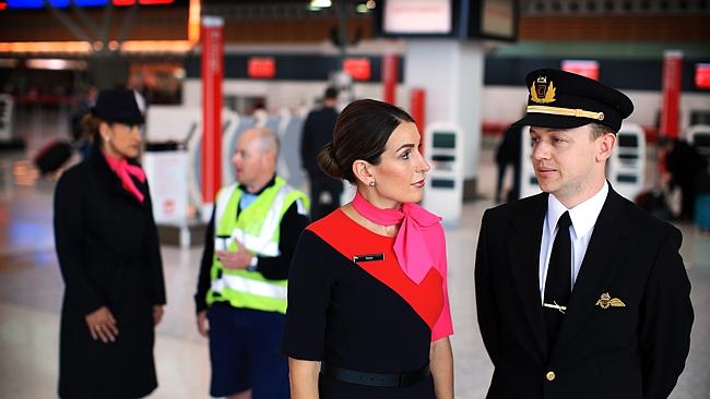 Qantas staff ... there are fears up to 5000 jobs at the struggling airline will be cut. 