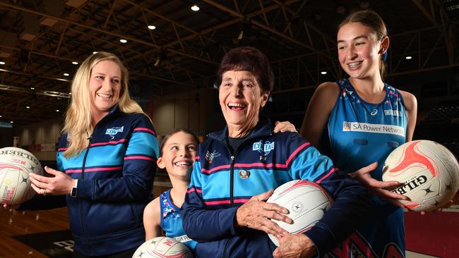 Pauline Fielden has been awarded an OAM for her contribution to sport in South Australia pictured with past and present players Jessica Mader, 35, granddaughter Tahlia Fielden, 10 and Tahlia Jolly, 15. Picture: Tricia Watkinson