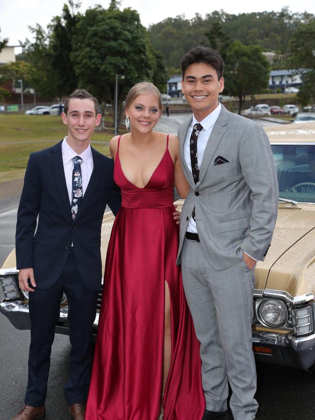 Pacific Pines High formal, at the school.Gareth Dandridge, Victoria Sessions and Jacob Newman, Picture Glenn Hampson