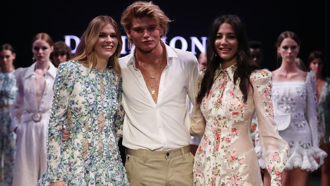 Victoria Lee, Jordan Barrett and Jessica Gomes walk the runway after wearing designs by Zimmerman at the David Jones show.