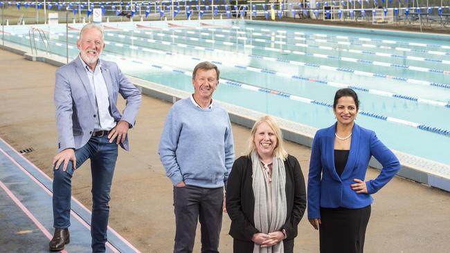 Hills Shire Councillors Brooke Collins, Alan Haselden, Mayor Michelle Byrne and Reena Jehti at Waves Aquatic Centre at Baulkham Hills, which will be redeveloped into a multimillion-dollar water park. Picture: AAP IMAGE / Troy Snook