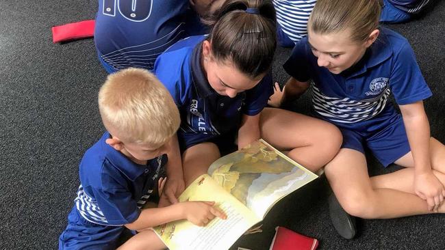 Frenchville students receive books from Rotary Clubs. Picture: contributed