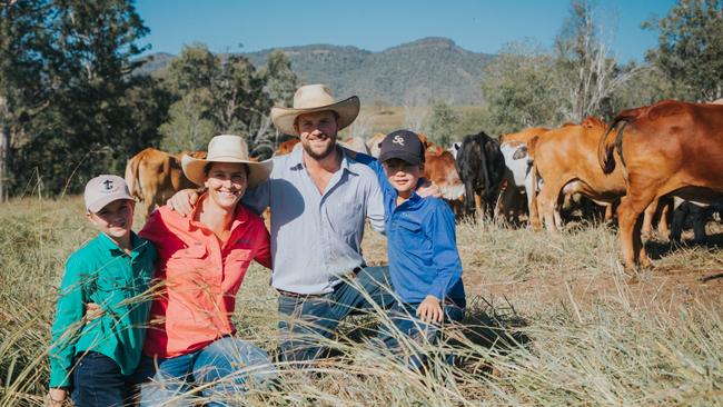 Queensland cattle farmer and Cattle Australia interim chief executive Adam Coffey with wife Jacynta and sons Will and Sam.