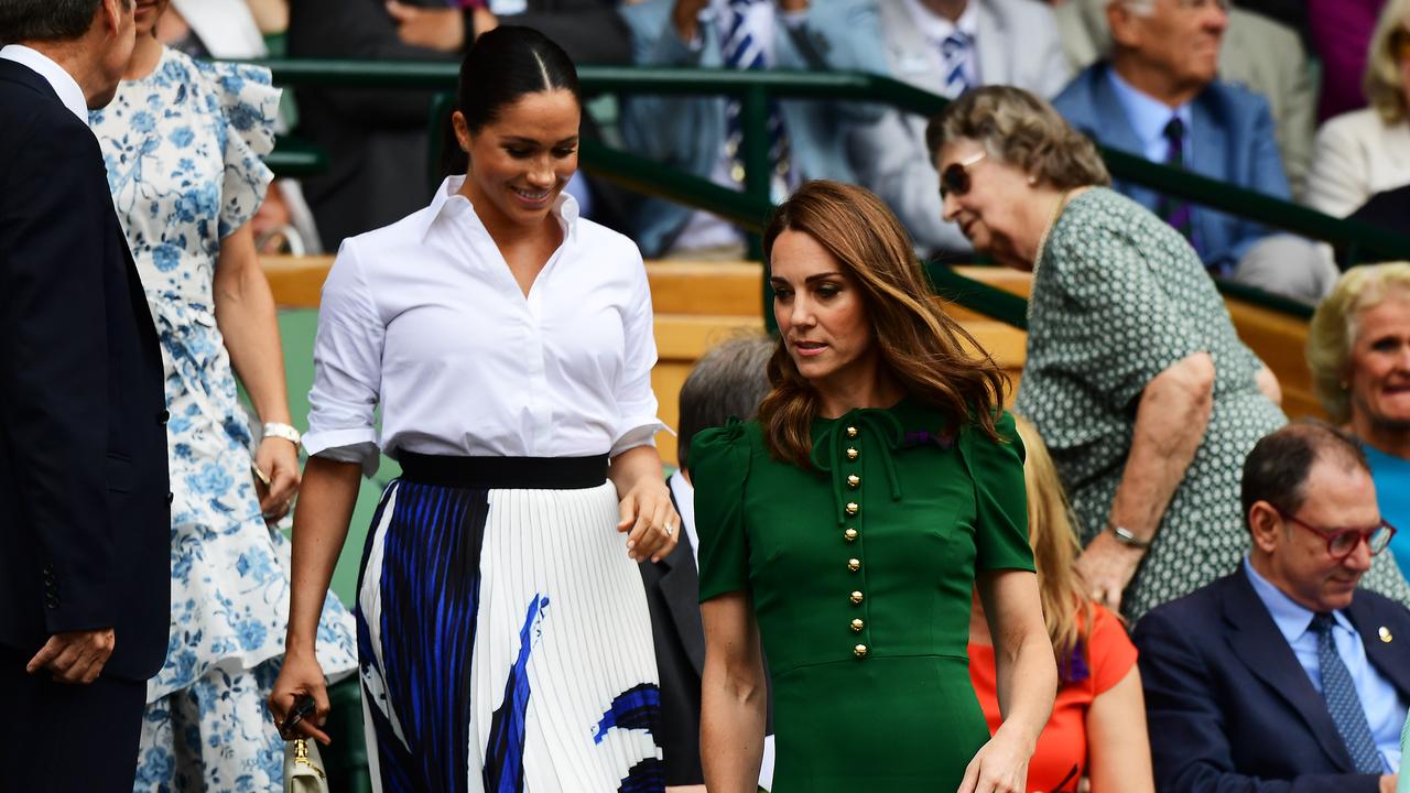 Kate and Meghan pretended to enjoy spending their off hours in the Wimbledon Royal Box with one another in 2019. Picture: Shaun Botterill/Getty Images