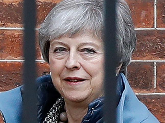 Britain's Prime Minister Theresa May leaves from the rear of 10 Downing Street in central London on April 1, 2019. - British MPs will try again to chart a new Brexit path on April 1 after rejecting Prime Minister Theresa May's deal for a third time, but the EU warned its patience was wearing thin. (Photo by Tolga AKMEN / AFP)