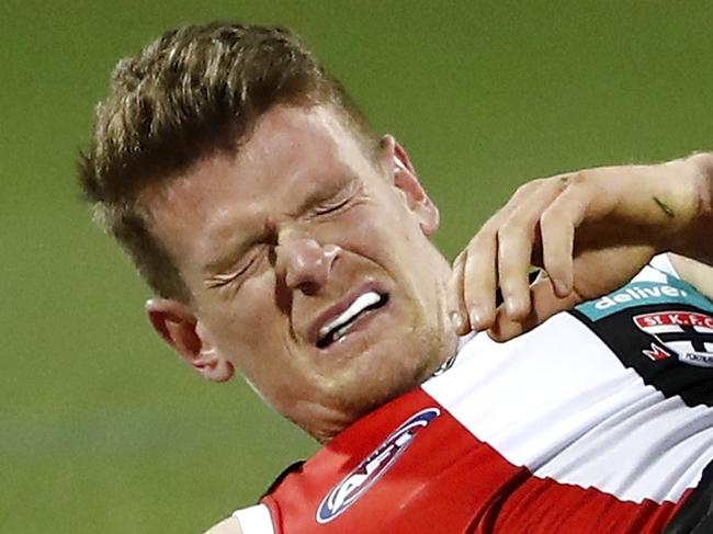 GEELONG, AUSTRALIA - AUGUST 14: Darragh Joyce of the Saints lays injured during the 2021 AFL Round 22 match between the Geelong Cats and the St Kilda Saints at GMHBA Stadium on August 14, 2021 in Geelong, Australia. (Photo by Dylan Burns/AFL Photos via Getty Images)