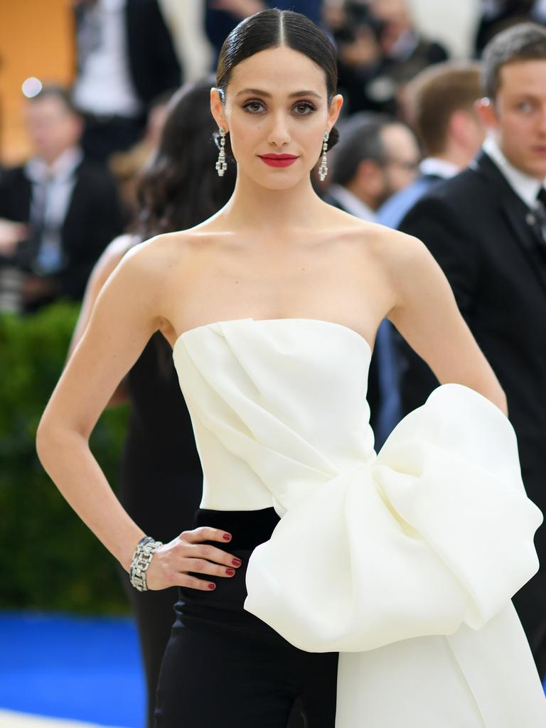 A very different-looking Emmy Rossum attends the 2017 Met Gala. Picture: Getty Images.