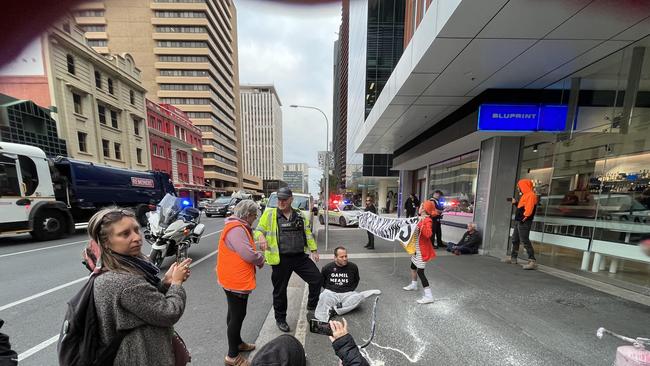 Protesters graffitied the Santos building on Thursday, with four due in court in the afternoon. Picture: Supplied.