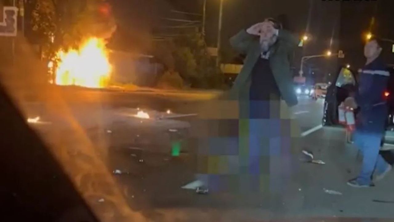 Vladimir Putin’s war guru Alexander Dugin was pictured in despair at the scene of the blast that killed his daughter. Picture: Twitter/@UrgentAlertNews