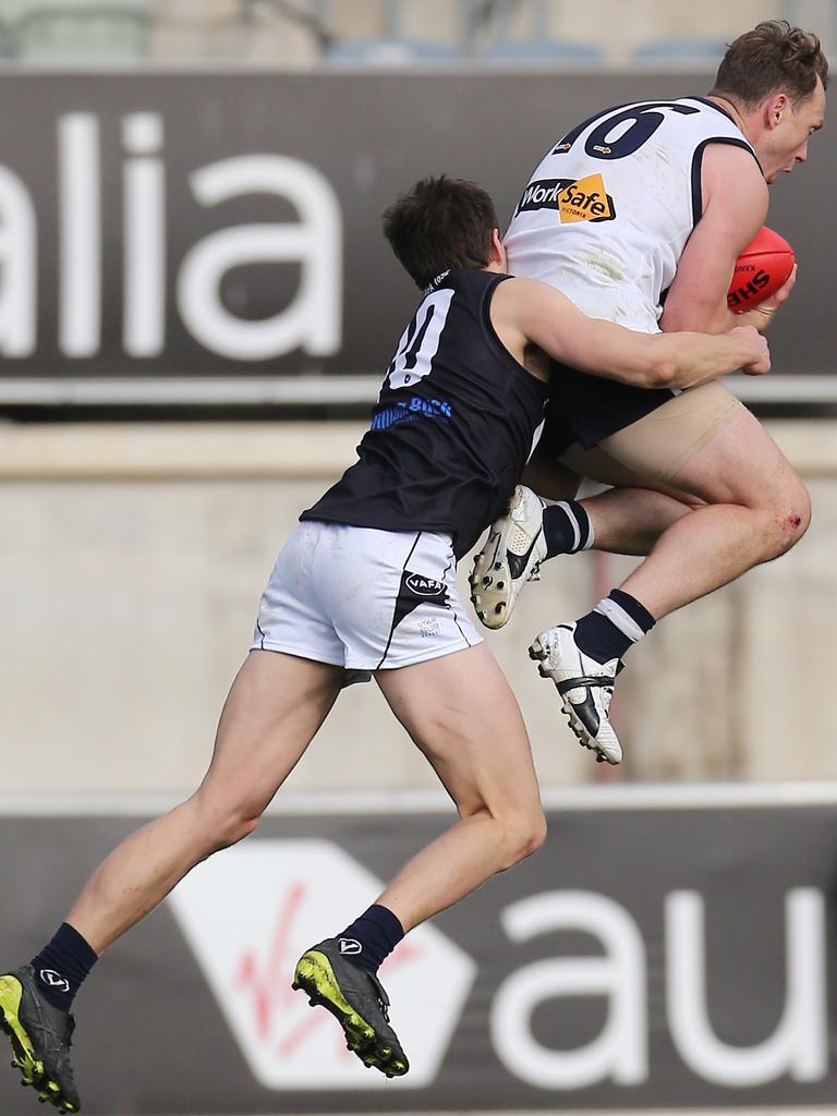 Vic Country’s Kayne Pettifer and VAFA’s Conor Ross at Ikon Park, Carlton. Picture: Yuri Kouzmin