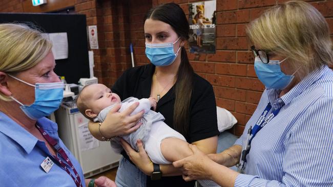 Jackie, a nurse immuniser at Barwon Health, Mercedes Grundy and baby Tiaki 6 months and Karen a nurse Picture: Mark Wilson