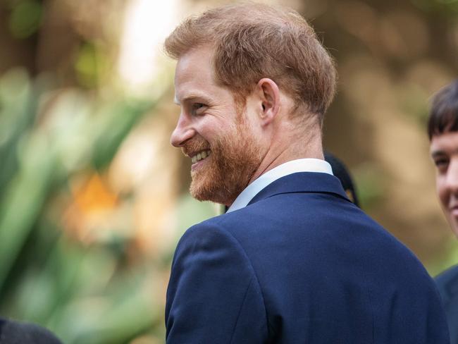 Britain's Prince Harry, Duke of Sussex(front) arrives at the British High Commissioner residency in Johannesburg. Picture: Michele Spatari/AFP