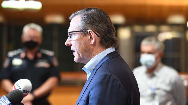 NT Chief Minister Michael Gunner, Police Commissioner Jamie Chalker and Deputy Chief Health Officer Dr Charles Pain address Territorians late in the evening about an lockdown for Katherine. Picture: (A)manda Parkinson