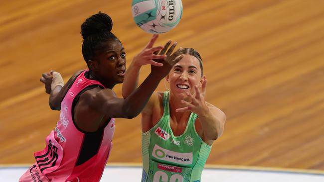 Latanya Wilson of the Thunderbirds competes for the ball against Olivia Wilkinson of the Fever during the 2025 Suncorp Team Girls Cup final. Photo: Getty Images