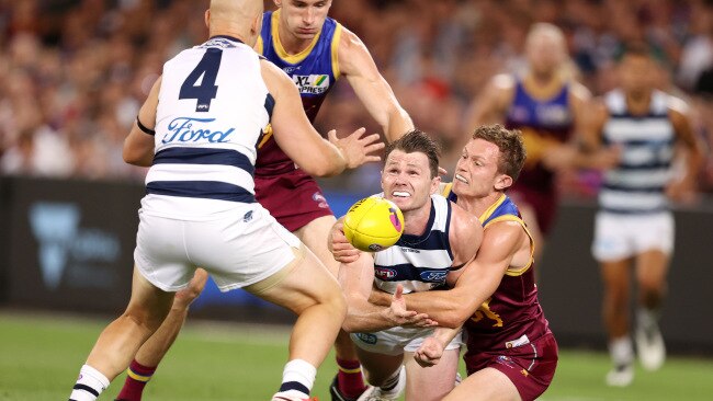 Patrick Dangerfield gives off a clear throw to Gary Ablett to set up a third-quarter goal. Picture: Michael Klein