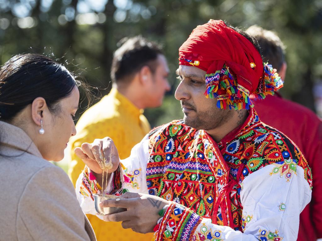 Himmat Chavada applies tilak to attendees at Toowoomba's Festival of Chariots, Saturday, July 20, 2024. Picture: Kevin Farmer