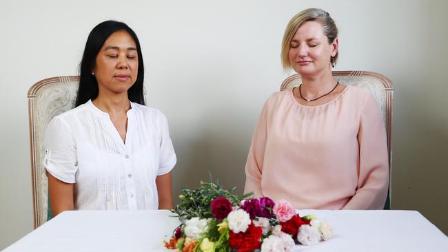 Transcendental Meditation is growing in popularity among Cairns residents seeking a more relaxed way of living. Certified Transcendental Meditation Teacher Treya Yew Ling Tan and meditation student Brianne Torison meditate together. Picture: Brendan Radke