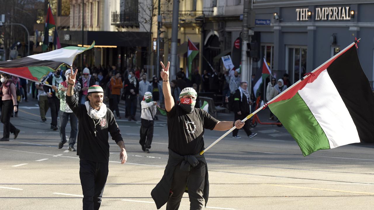 Several people were seen flying the Palestinian flag. Picture: NewsWire / Andrew Henshaw