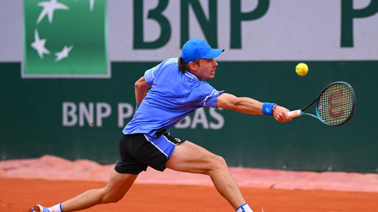 PARIS, FRANCE – JUNE 01: Alex De Minaur of Australia plays a backhand against Jan-Lennard Struff of Germany in the Men's Singles third round match during Day Seven of the 2024 French Open at Roland Garros on June 01, 2024 in Paris, France. (Photo by Clive Mason/Getty Images)
