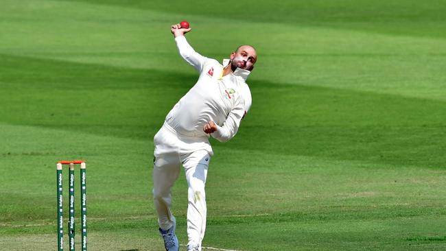 Nathan Lyon claimed four wickets in just six balls to decimate Pakistan’s top order. Picture: AFP