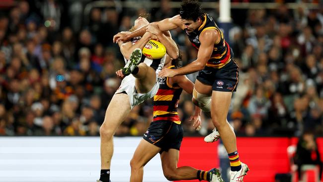 Nathan Murphy’s head snapped back from the contact. Photo by James Elsby/AFL Photos via Getty Images.