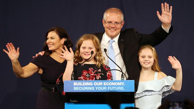 Scott Morrison claims victory along with wife Jenny and daughters Lily and Abigail. Picture: Sam Ruttyn