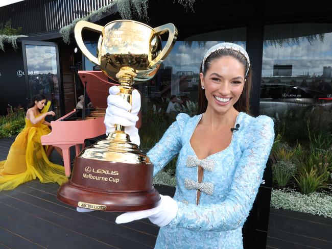 Demi Brereton holds the 2024 Lexus Melbourne Cup. Picture: David Caird