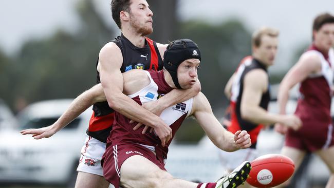 Clarence's Brady Jones is tackled by North Launceston's Fletcher Bennett in round 10. Picture: Zak Simmonds