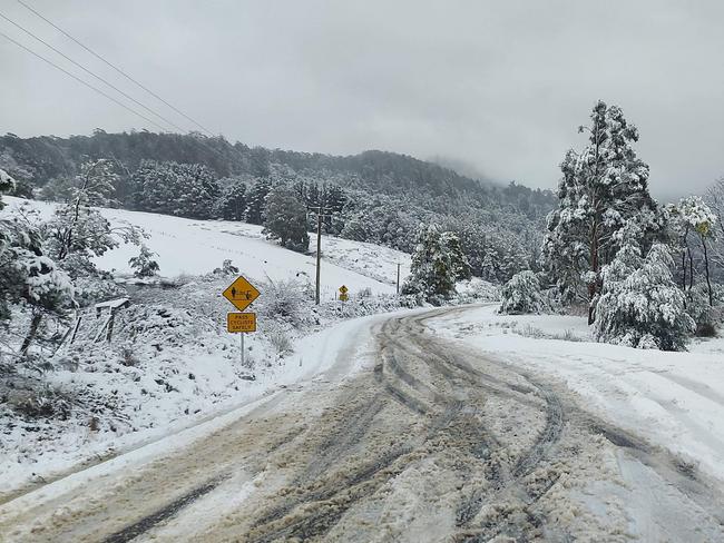Snow in Tasmania. Huon Rd at Lower Longley. Picture: HAYDEN APPLEBEE