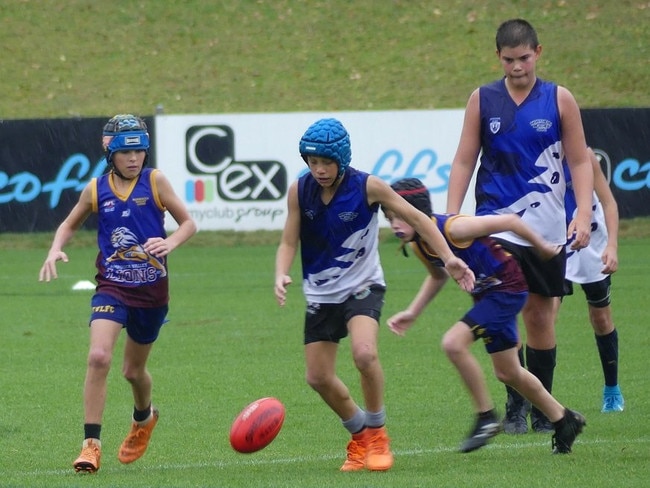 Nambucca Valley Lions and Northern Beaches Blues do battle at the AFL North Coast junior finals.