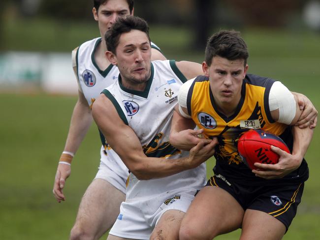 NFL footy: Whittlesea V Northcote Park at Whittlesea Showgrounds. Justin Chilcott from Northcote Park and Jay Russell from Whittlesea. Picture: Richard Serong