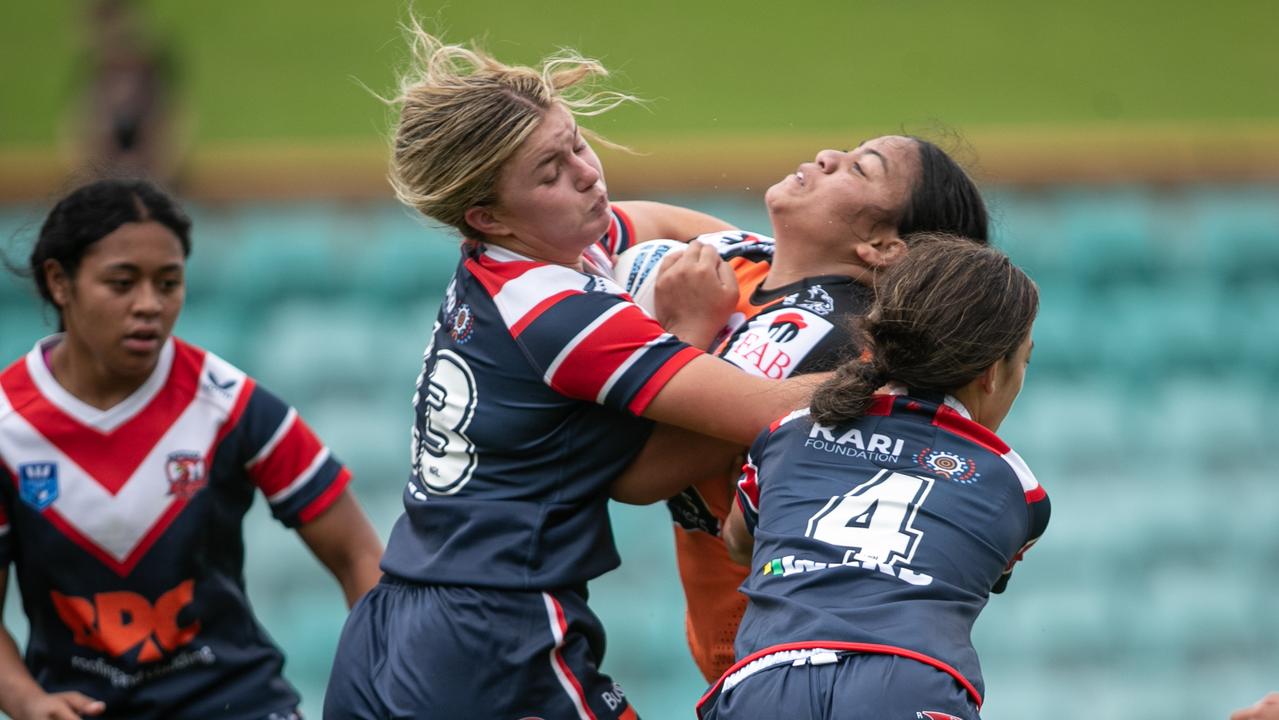 Lacey Cross makes a big tackle. Picture: Julian Andrews