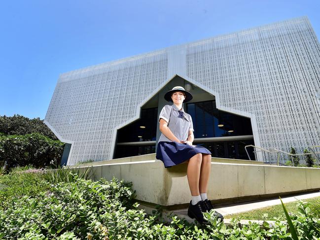 Chloe Dickinson, 17, in the new $19 million three-storey East Precinct building at St PatrickÃ•s College Townsville. Picture: Shae Beplate.