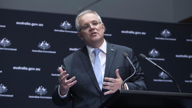 Prime Minister Scott Morrison addresses media alongside Chief Medical Officer Professor Paul Kelly at Parliament House on Friday. Picture: NCA NewsWire /Gary Ramage