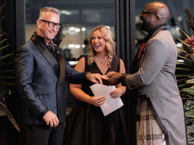 Greg Fisher and Hanniel ‘Billy’ Mbatia get married by Fisher’s daughter Carly Fisher, who served as marriage celebrant. Picture: Claudine Wakim/Captured by Claudine.