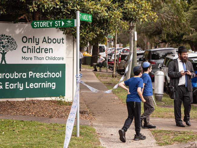 2101/25. The Daily Telegraph. News. Maroubra, Sydney, NSW. Pics by Julian Andrews.Members of the local Jewish community in Maroubra arrive with their children at the childcare centre which last night was firebombed  in an anti-semitic attack.