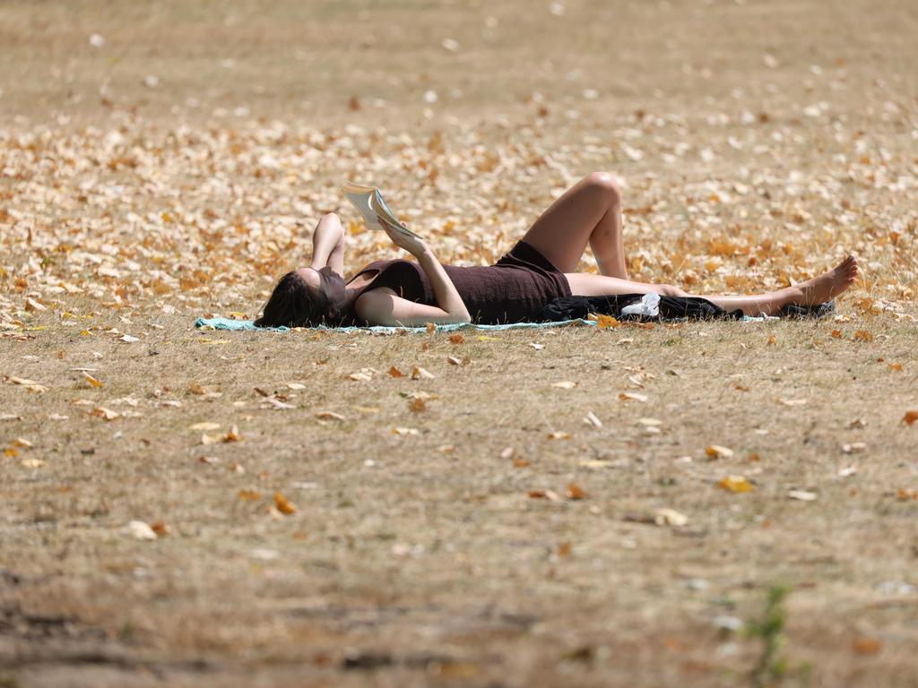 A woman sunbathes in Victoria Park in London, England. Picture: Getty Images