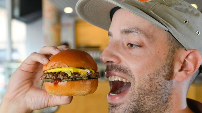 Burger Theory co-owner Dan Mendelson with the new kangaroo burger, in Adelaide. Picture: Brenton Edwards