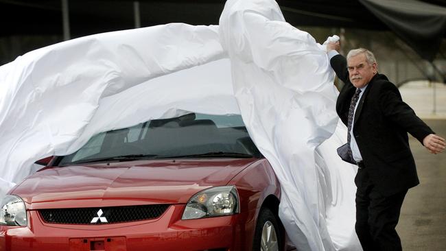 Mitsubishi Australia chief executive Tom Phillips unveiling the new 380 model at the company’s Tonsley plant in 2005. Picture: Mark Brake