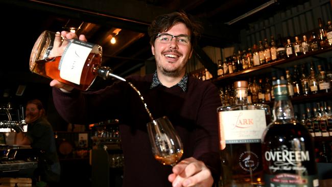 Nick Devereux gets ready for International Whisky Day at Lark Distillery Cellar Door in Hobart. Picture: FIONA HARDING