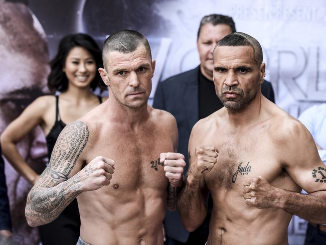 John Wayne-Parr (left) and Anthony Mundine at the weigh-in for their fight. (Photo by Albert Perez/Getty Images)