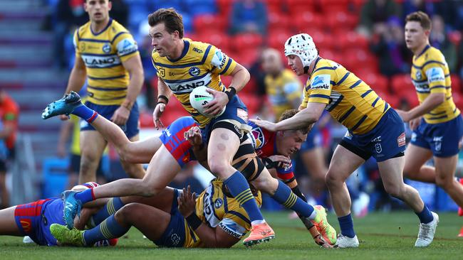 Eels captain Clint Gutherson breaks through the defence during the round nine NRL clash between the Newcastle Knights and Parramatta at McDonald Jones Stadium on Sunday. Picture: Getty Images