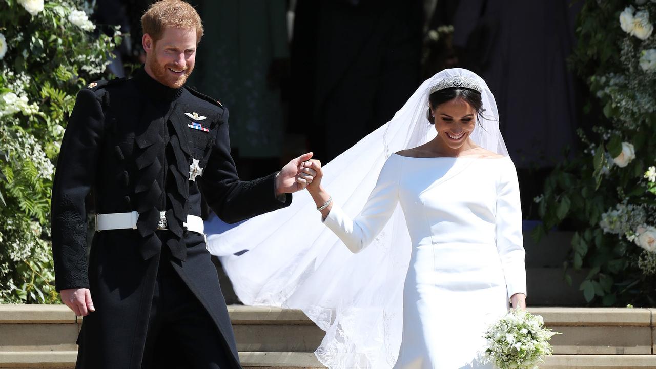 WINDSOR, UNITED KINGDOM - MAY 19:  Prince Harry and Meghan Markle leave St George's Chapel after their wedding in St George's Chapel at Windsor Castle on May 19, 2018 in Windsor, England. (Photo by Jane Barlow - WPA Pool/Getty Images)