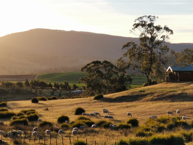 The sun sets on Curringa Farm in Hamilton, in the Derwent Valley.