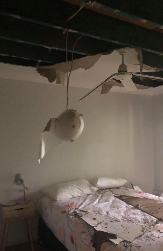 A spare bedroom on the bottom floor has led to its ceiling falling through, completely soaking the room.