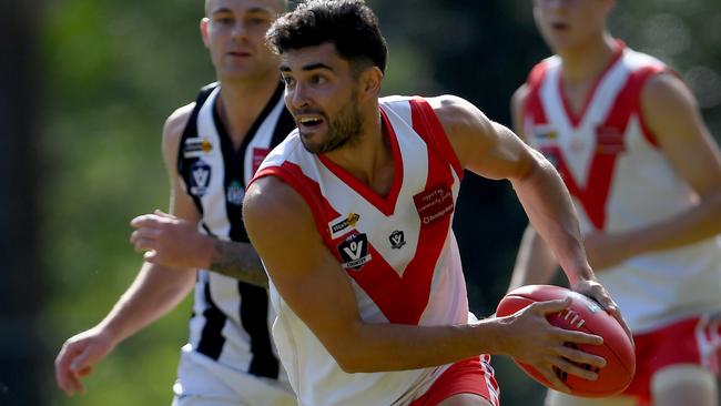 James Belli in action for Olinda-Ferny Creek. Picture: Andy Brownbill