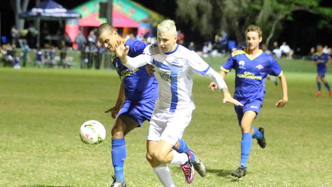 FFA Cup regional qualifier, Surfers Paradise Apollo (white) vs. South West Queensland Thunder. Photo of Lyndon Dykes (white) and Rowan Salomon. Photo: Richard Gosling